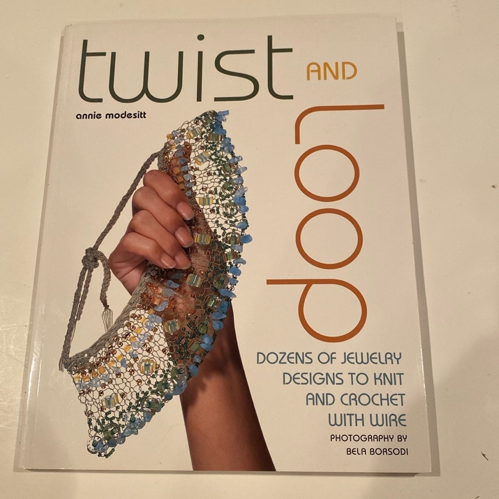 NWT “Twist and Loop,” oversized stiff soft cover